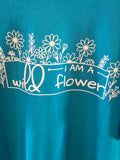 I am a wildflower.  Teal Youth Tee.