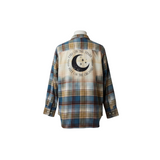 Plaid shirt with a moon and star design on a white background