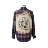 Plaid shirt with sunflower graphic and text on a mannequin against a white background