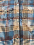 Plaid shirt with brown, blue, and beige colors on a white background